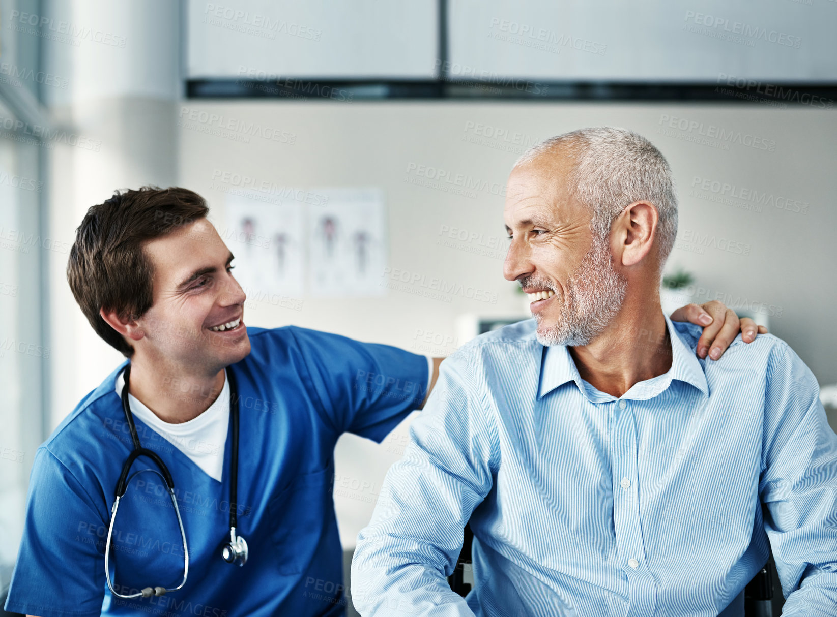 Buy stock photo Senior, man and nursing with patient in hospital, care and together for wellness consultation with medical employee. Support, healthcare and medicine help with smile or happy people, clinic and trust