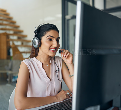 Buy stock photo Woman, call center and smile by computer for consulting, listening and reading with voip. Agent, headphones and mic for tech support, telemarketing or happy for customer care with advice in workplace