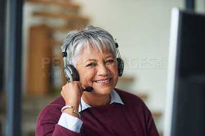 Buy stock photo Portrait of a mature woman working on a computer in a call centre