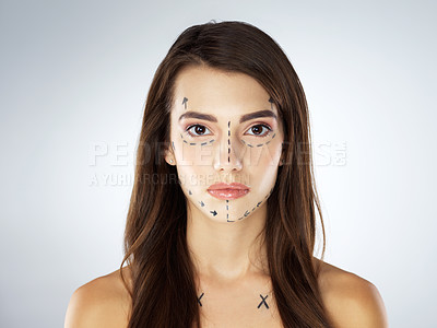 Buy stock photo Woman, face and arrow in studio for plastic surgery, chin augmentation and cosmetic procedure. Female person, portrait and rhinoplasty on white background for beauty, liposuction and transformation