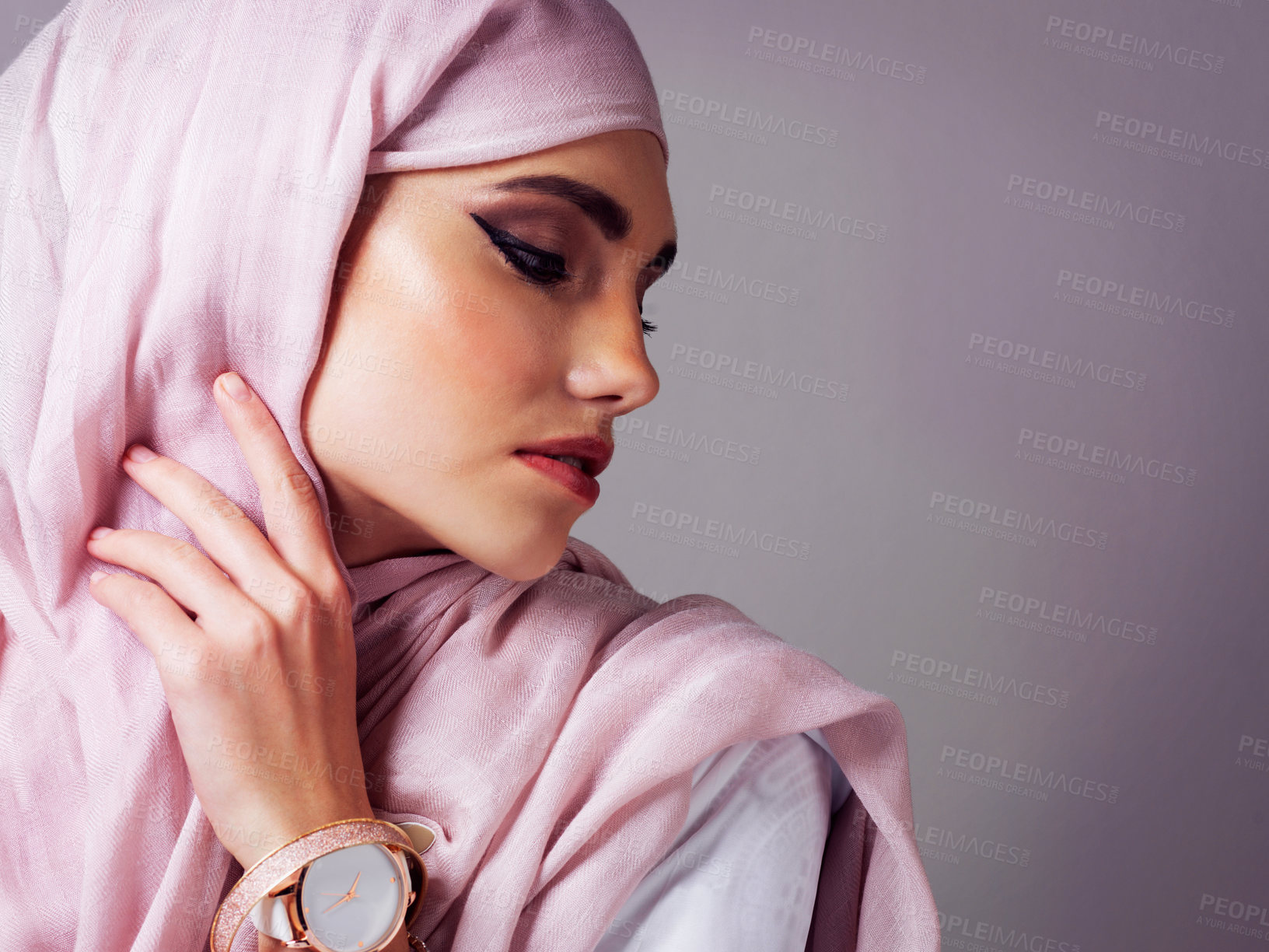 Buy stock photo Hijab, profile and mockup with woman in studio for islamic fashion, arabic culture or modest clothes. Raya, eid Mubarak celebration and elegance with muslim person on background for oriental design
