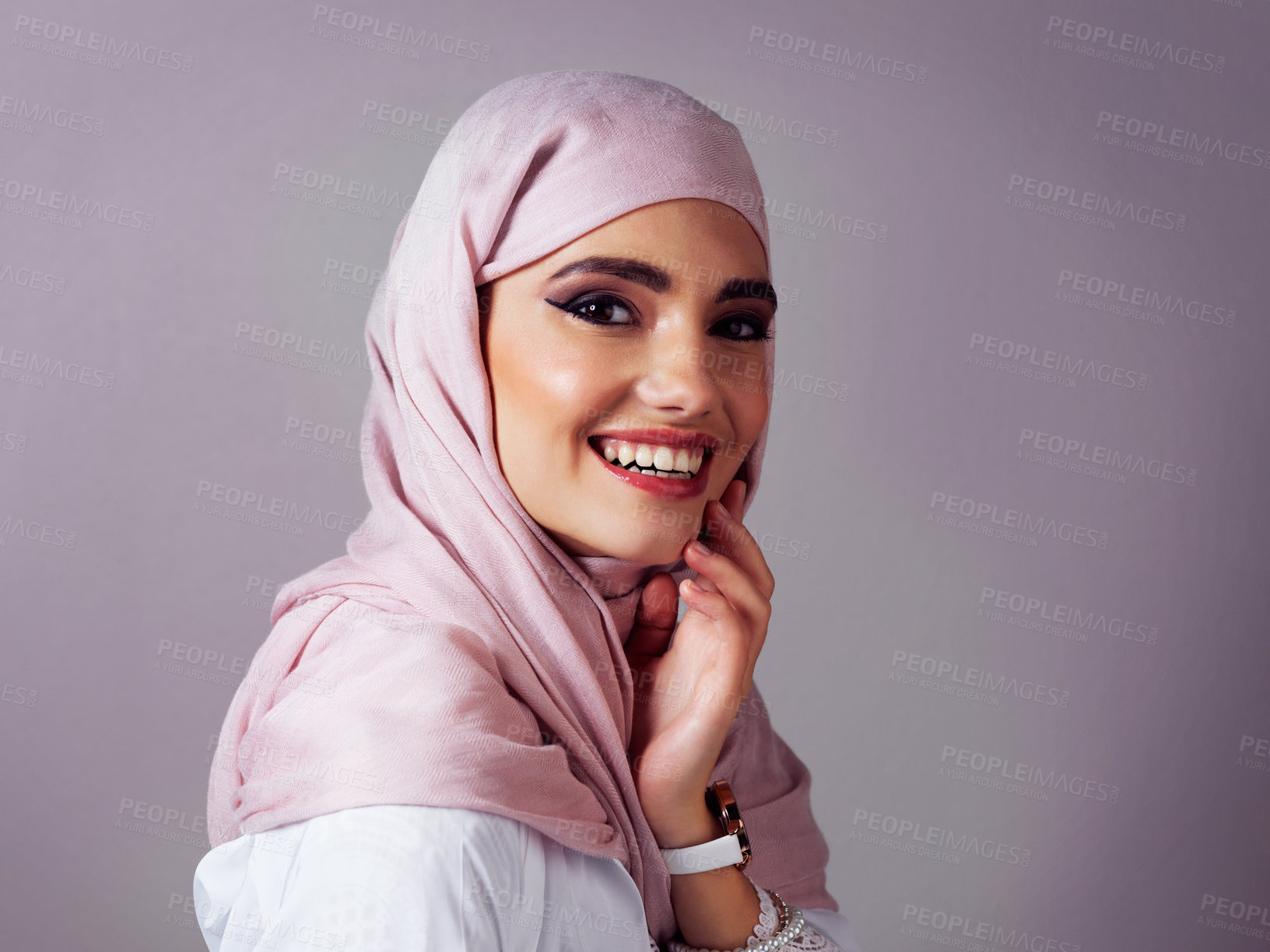 Buy stock photo Smile, portrait and makeup with muslim woman in studio for islamic style, arabic culture and raya clothes. Fashion, eid Mubarak celebration and hijab with person on background for oriental design