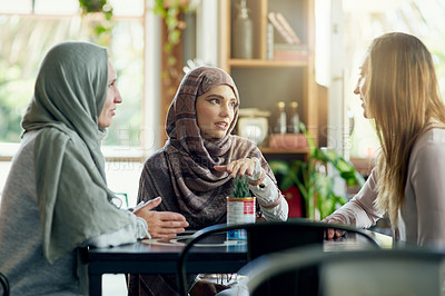 Buy stock photo Friends, talking and Muslim women in cafe, bonding and speaking together. Coffee shop, relax and Islamic girls, group or people in conversation, chat and discussion for social gathering in restaurant