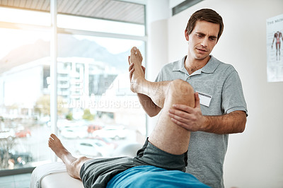 Buy stock photo Knee, man or physiotherapist with leg rehabilitation in office for injury with orthopedic support. Healing, mobility or professional pt with physiotherapy service for muscle recovery or help