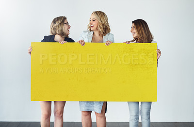 Buy stock photo Women, happy or poster mockup in studio for job opportunity, information or business idea. People, laugh or team at board space for product placement, promotion or presentation on white background