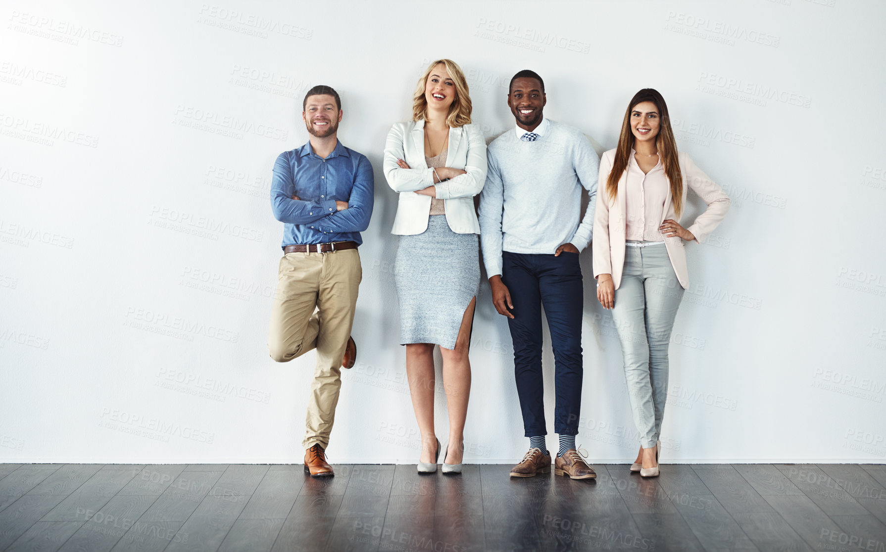 Buy stock photo Portrait, diversity and collaboration with business people in studio together against a gray wall for mockup. Teamwork, confidence or professional with a group of colleagues in the office for success