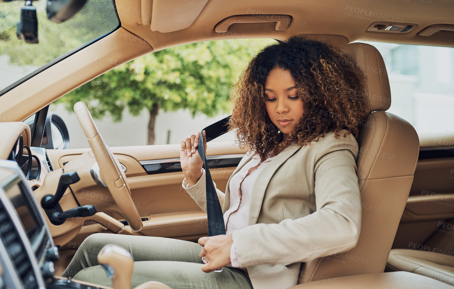 Buy stock photo Shot of an attractive businesswoman on her morning commute