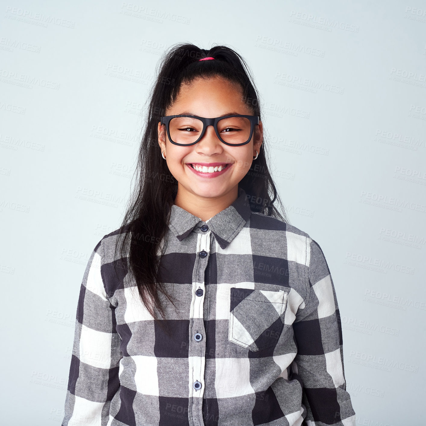 Buy stock photo Studio, fashion and portrait of kid with glasses for eyesight, nerd style and trendy clothes. Girl, child and smile with happiness for quirky outfit, confidence and pride on white background