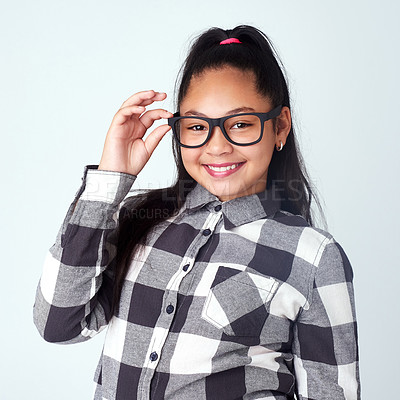 Buy stock photo Studio, glasses and portrait of girl with eye care for clear vision, wellness and optometry.  Kid, spectacles and smile of child with happiness for eyesight, pride and confidence on white background