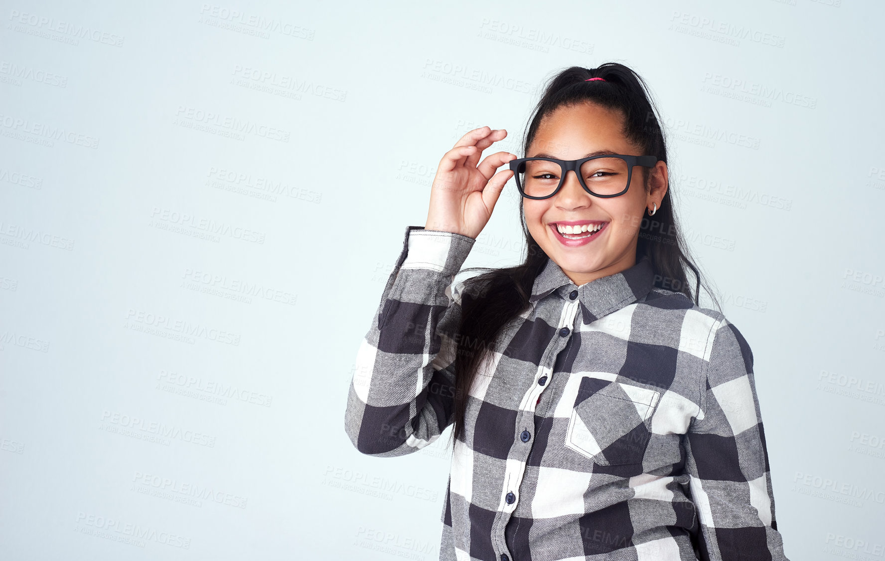 Buy stock photo Eye care, studio and portrait of child with glasses for optometry, wellness and healthy eyesight. Mockup, girl and prescription spectacles of kid with smile, pride and confidence on white background