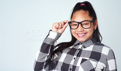 Buy stock photo Studio, fashion and portrait of child with glasses for eyesight, nerd style and joy in quirky outfit. Girl, kid and smile with happiness for trendy clothes, confidence and pride on white background