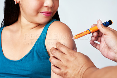 Buy stock photo Hands, girl or insulin shot in healthcare for blood sugar levels, glucose or energy for body. Young person, child and injection for wellness in white background, diabetes or medical treatment for kid