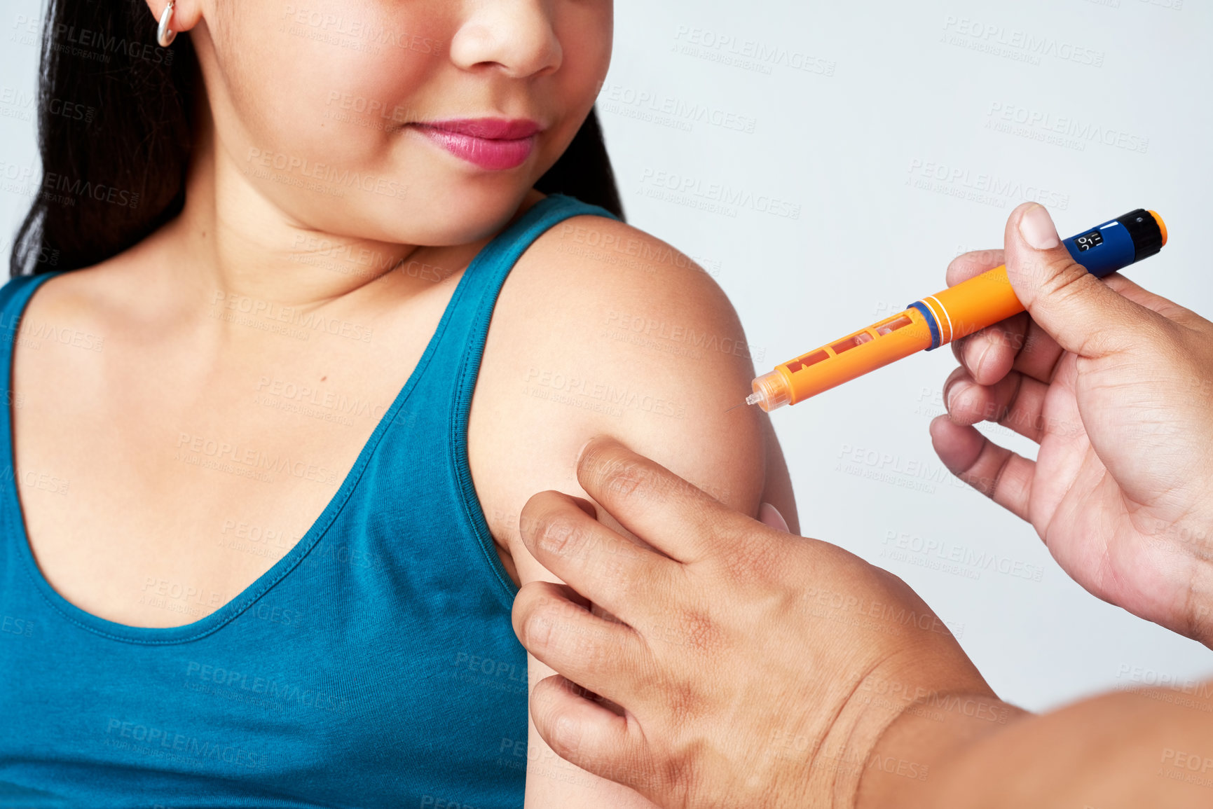 Buy stock photo Hands, girl or insulin shot in healthcare for blood sugar levels, glucose or energy for body. Young kid, child and injection for weight loss on white background, diabetes or medical treatment