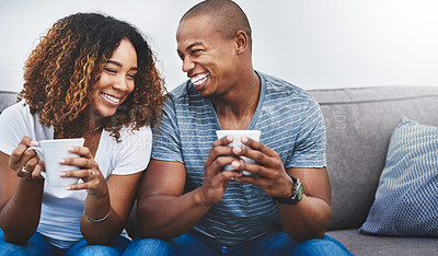 Buy stock photo Happy, laugh and couple with coffee on sofa for talking, conversation and bonding together on weekend. Love, relationship and African man and woman with drink, warm beverage and tea to relax in home