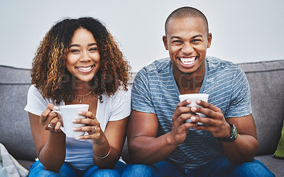 Buy stock photo Portrait of a young couple relaxing together at home