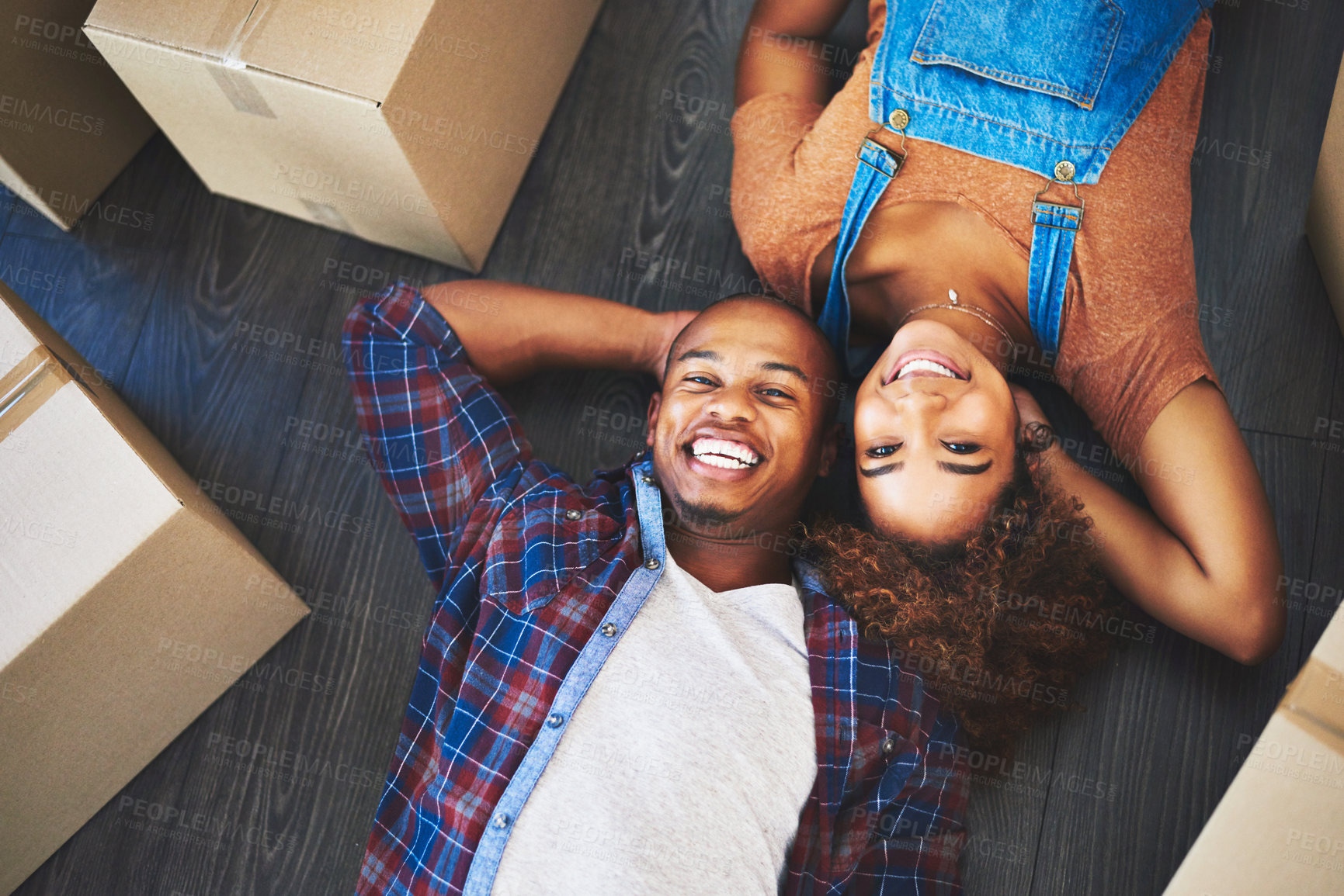 Buy stock photo Happy couple, boxes and portrait to new home for moving, property purchase and relax on floor. People, investment and apartment relocation for dream house, love and cardboard for packing in lounge