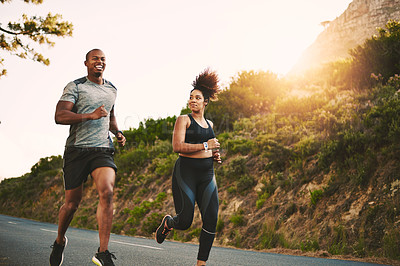 Buy stock photo Sports, health and couple running by mountain training for race, marathon or competition. Fitness, nature and African runners doing outdoor cardio workout or exercise on road trail together at sunset