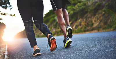 Buy stock photo Fitness, legs and people running in road for outdoor race or marathon training in mountain. Sports, friends and feet of athletes with cardio workout for endurance exercise in street for wellness.