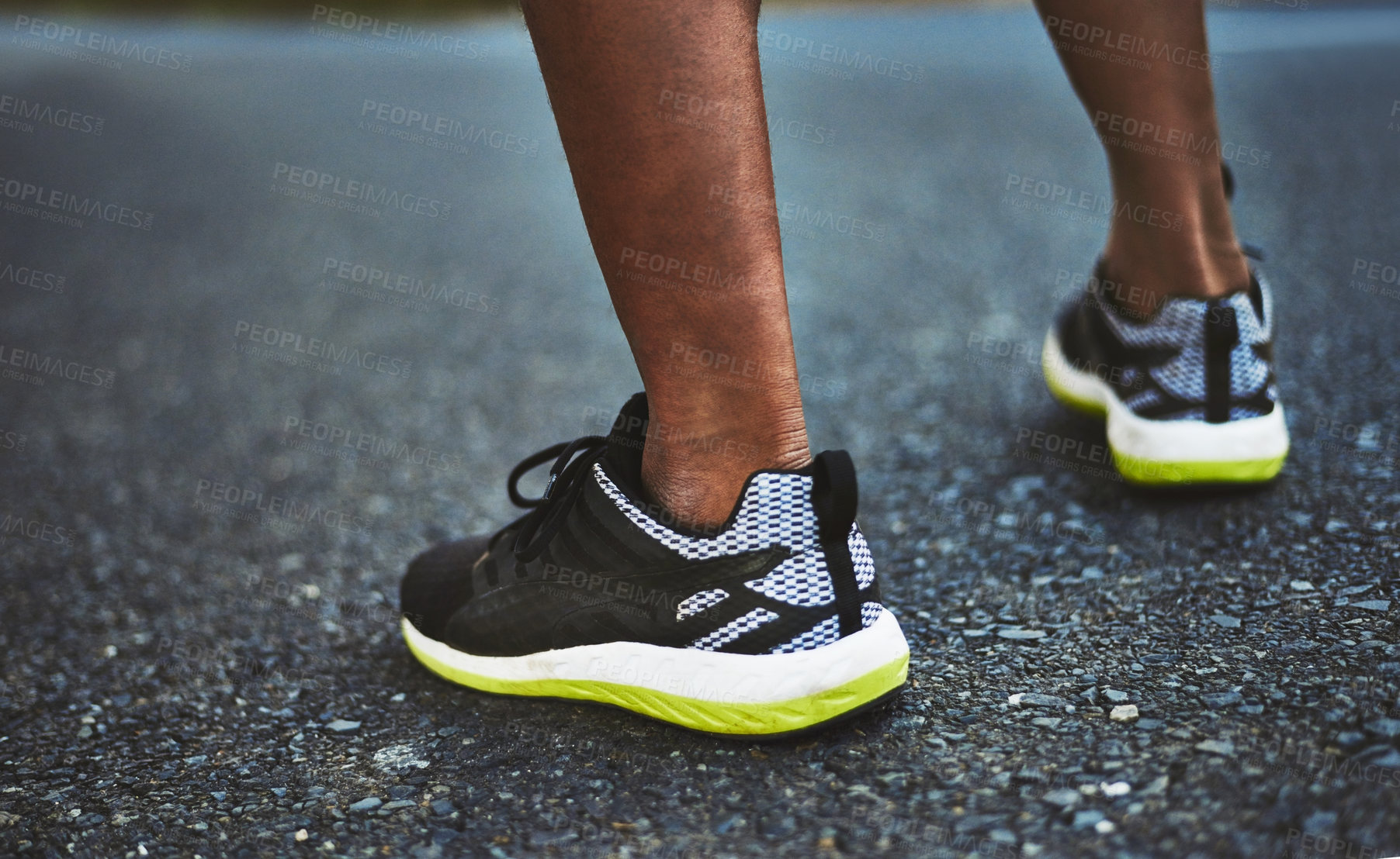 Buy stock photo Cropped shot of an unrecognizable man wearing comfortable running shoes