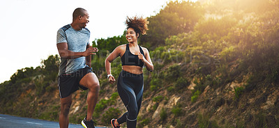 Buy stock photo Fitness, exercise and couple running in nature by a mountain training for a race, marathon or competition. Sports, health and athletes or runners doing an outdoor cardio workout together at sunset.