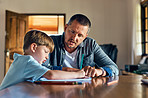 Dad helps him everyday to get his homework done