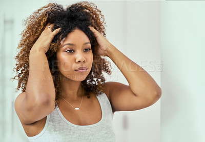 Buy stock photo Black woman, curly hair and beauty in home bathroom, healthy afro hairstyle and morning routine. Young african american girl, texture and volume of natural hair care, big hair style and aesthetics 
