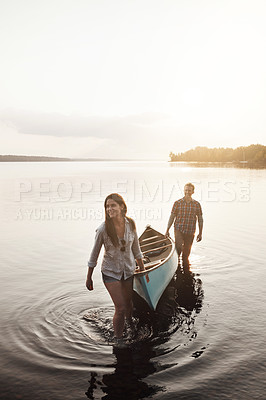 Buy stock photo Man, woman and memory with boat by lake for journey, adventure and sunset in nature. Couple, outdoor and thinking or happiness for travel, freedom and support or canoe for summer by river or water 