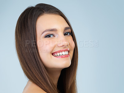 Buy stock photo Hair, beauty and portrait of woman with smile on blue background for wellness, skincare and spa treatment. Salon aesthetic, dermatology and face of happy girl with cosmetics, makeup and facial glow
