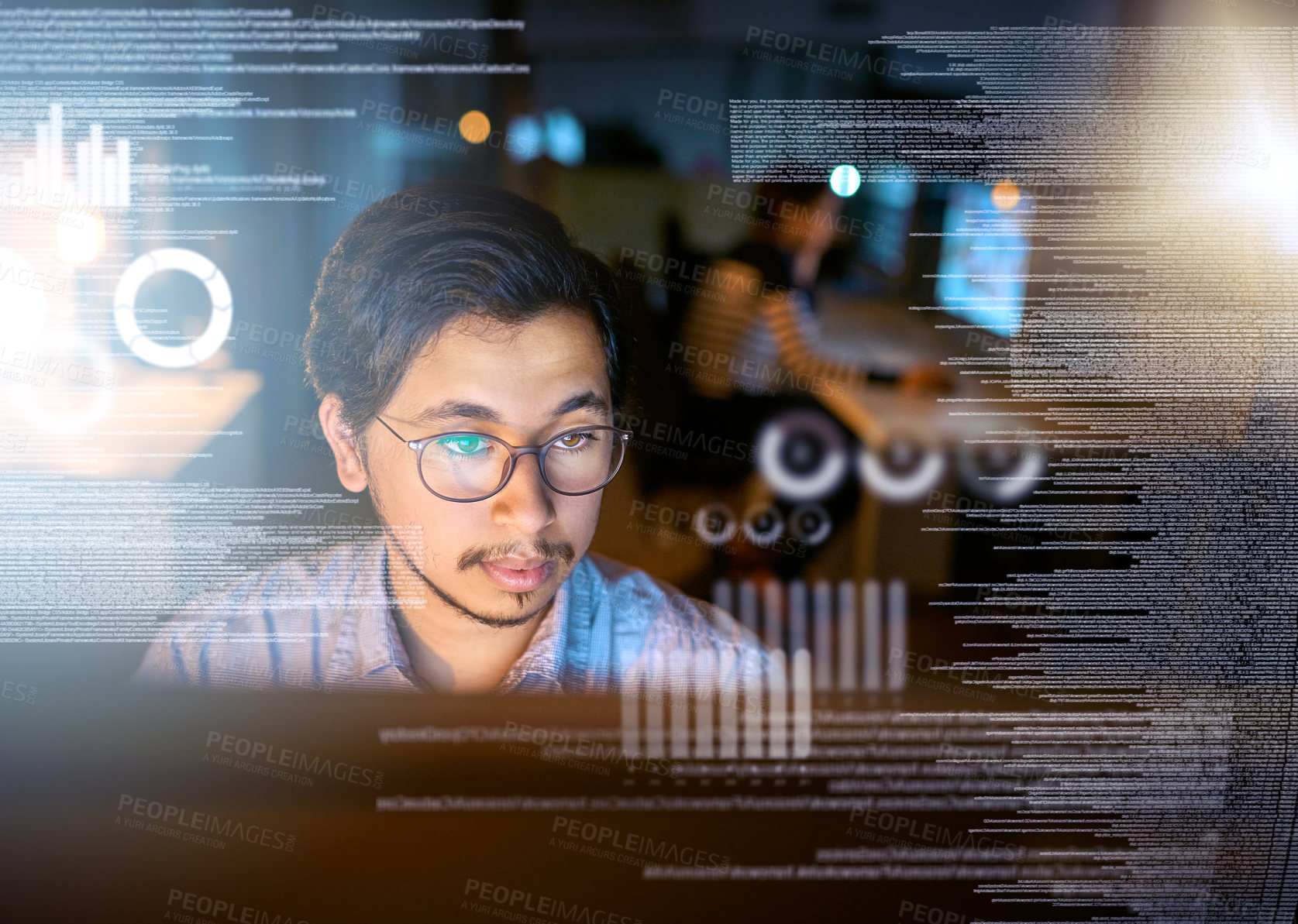 Buy stock photo Shot of a computer programmer looking through data in the office