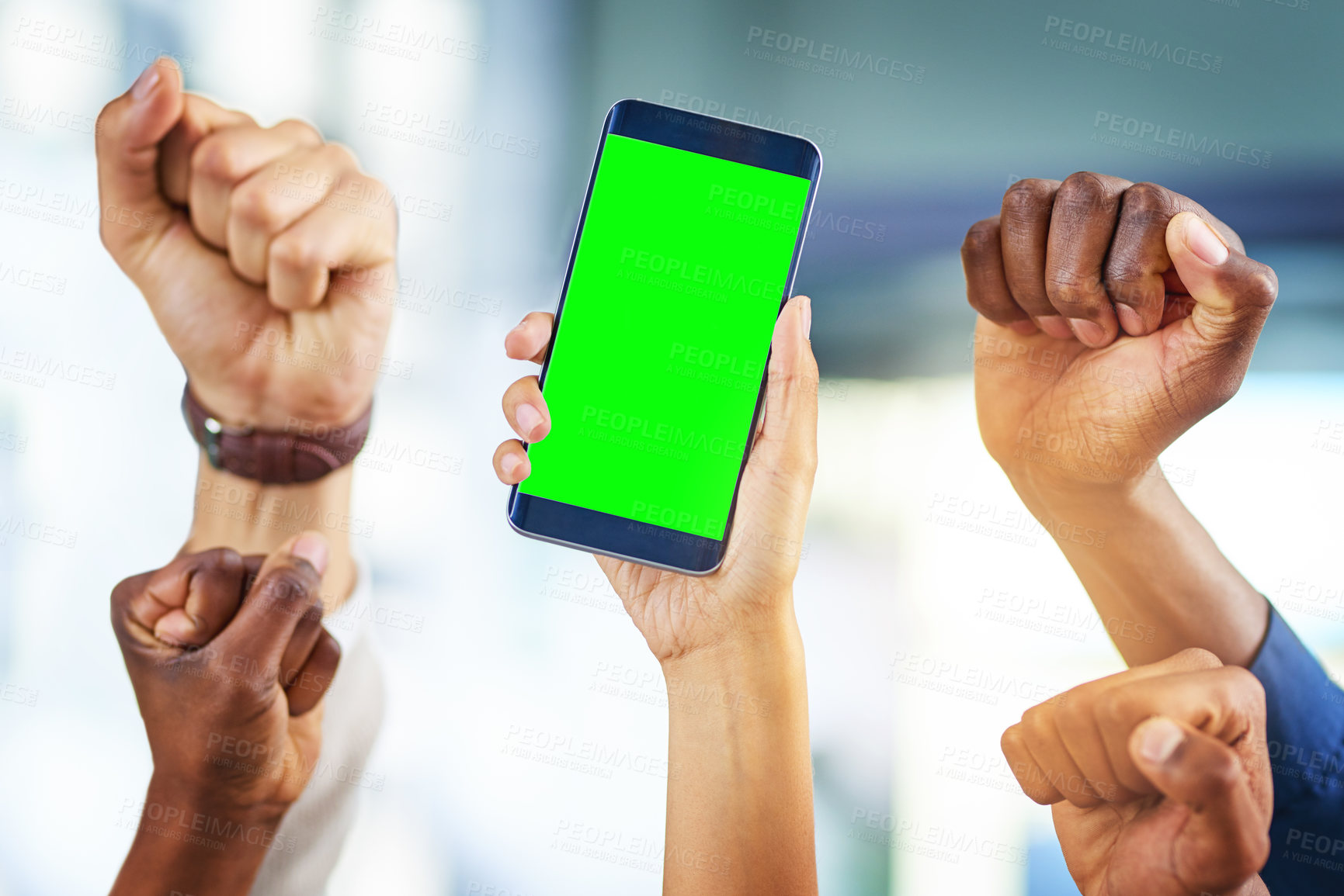 Buy stock photo Cropped shot of a group of businesspeople cheering and holding a mobile phone in a modern office