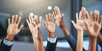 Buy stock photo Cropped shot of a group of businesspeople raising their hands