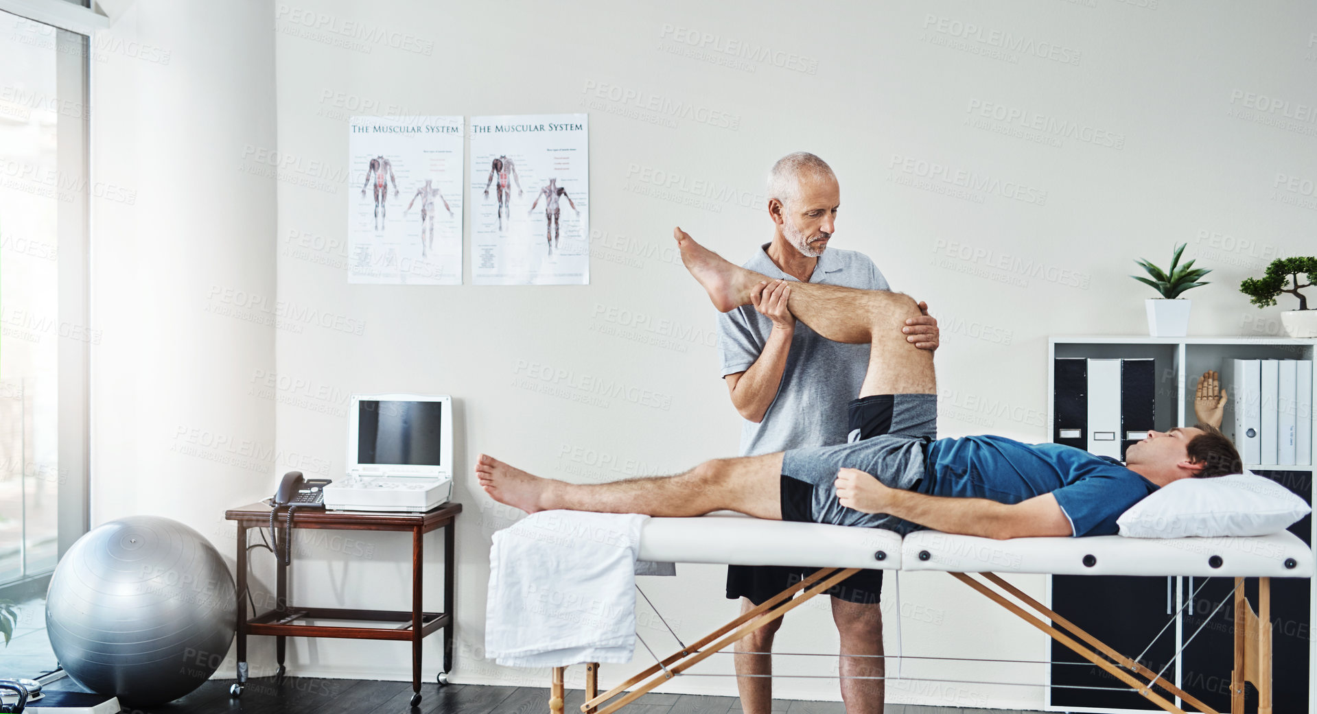 Buy stock photo Support, physiotherapist or patient with leg injury, recovery or healthcare for wellness. Male person, client or chiropractor with skills, stretching legs or consultation for physiotherapy or healing