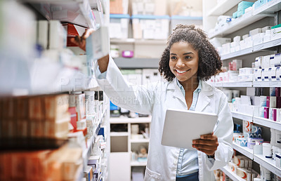 Buy stock photo Pharmacy, healthcare and black woman with medicine, tablet and inventory with checklist in store for pills. Shop, person and smile for process of prescription, online and working of employee in job