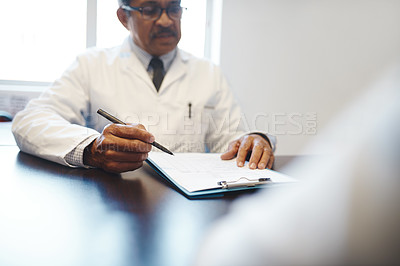 Buy stock photo Mature, doctor and paperwork in consultation with patient for medical report, healthcare diagnosis and test results. Medicine, people or clipboard with filing health insurance in clinic for treatment