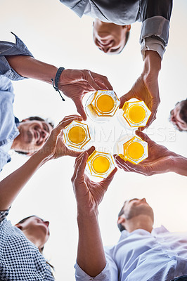 Buy stock photo Low angle shot of businesspeople having drinks on their office balcony