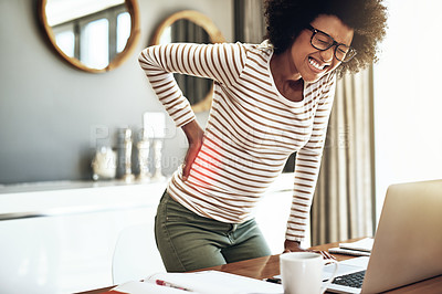 Buy stock photo Black woman, laptop and back pain injury in remote work, stress or bad posture from overworked strain at home. African female person or freelancer with painful backache, spine or discomfort by desk