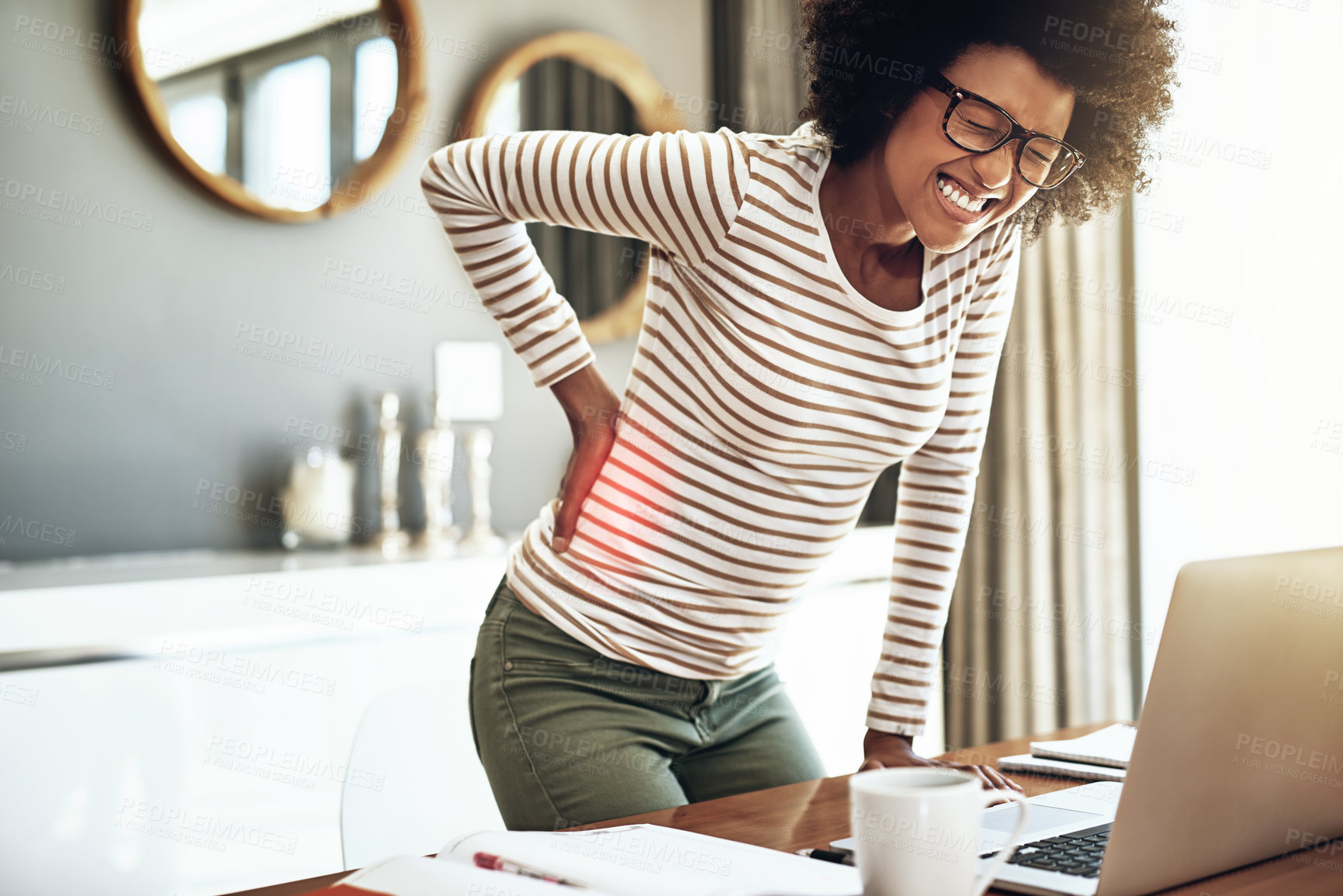 Buy stock photo Black woman, laptop and back pain injury in remote work, stress or bad posture from overworked strain at home. African female person or freelancer with painful backache, spine or discomfort by desk