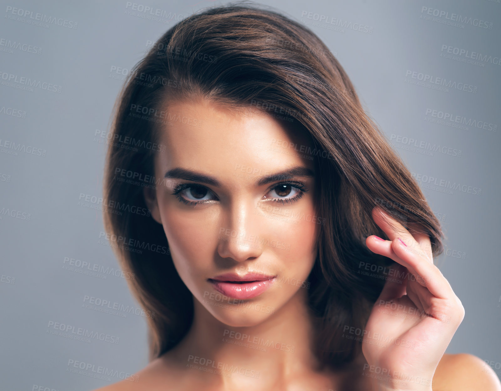 Buy stock photo Salon, hairstyle and portrait of woman in studio for glow, beauty and hair gloss treatment. Scalp health, makeup and growth with person on gray background for haircare cosmetics, volume and keratin