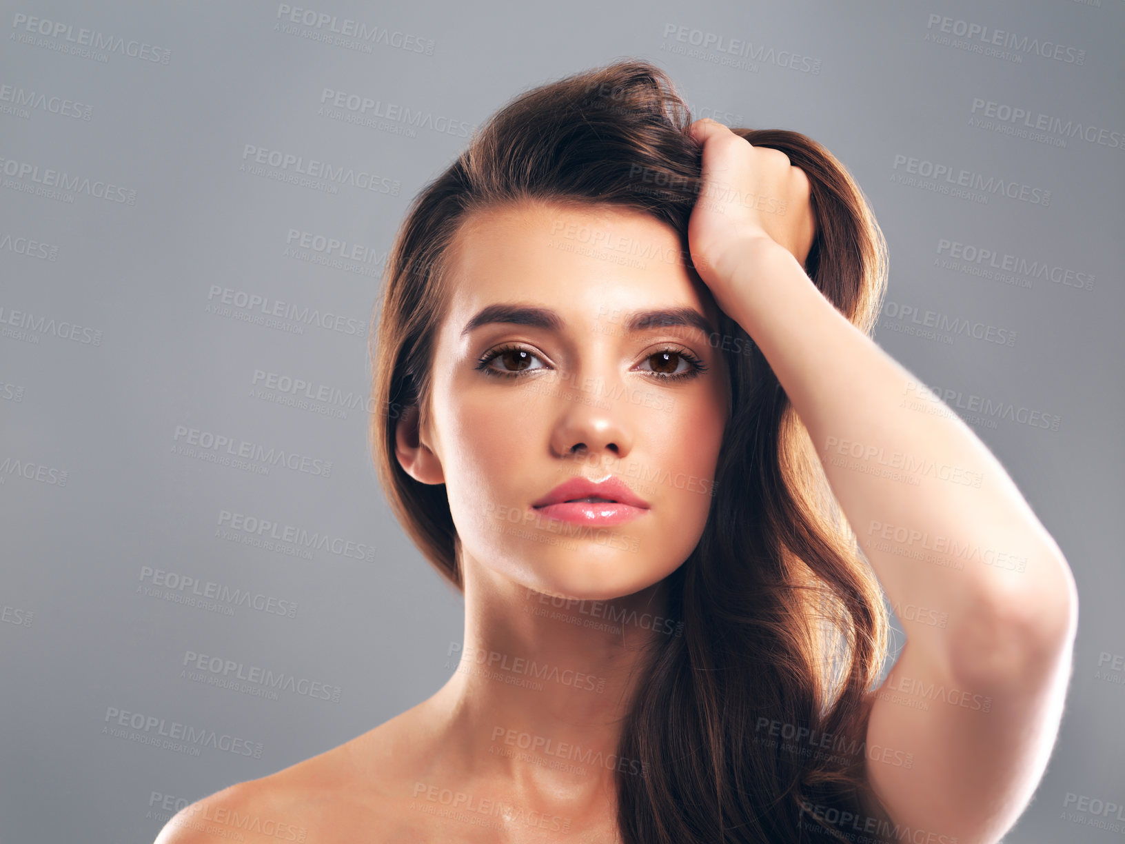 Buy stock photo Aesthetic, hairstyle and portrait of woman in studio for glow, beauty and hair gloss treatment. Scalp health, salon and growth with person on gray background for haircare cosmetics, volume or keratin