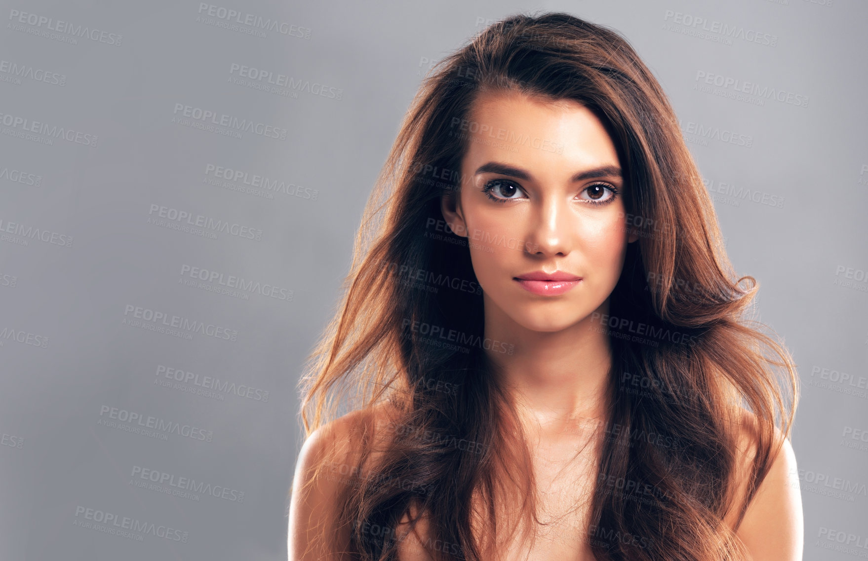 Buy stock photo Health, hairstyle and portrait of woman in studio for glow, volume and hair gloss treatment. Scalp beauty, mockup and growth with person on gray background for haircare cosmetics, salon and keratin 