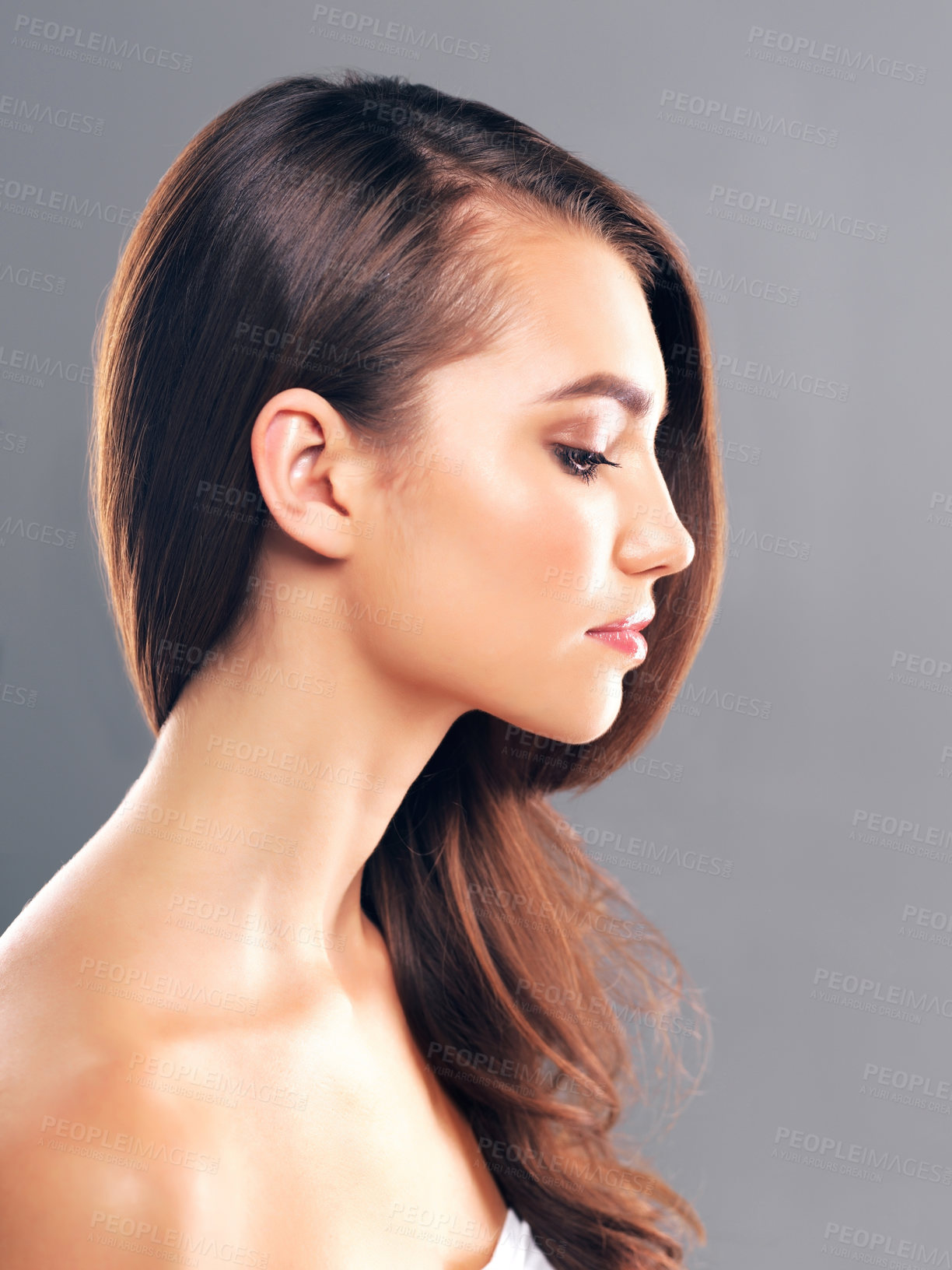 Buy stock photo Beauty, hairstyle and shine with profile of woman in studio for glow, volume and hair gloss treatment. Scalp health, shampoo and growth with person on gray background for haircare, salon and keratin 