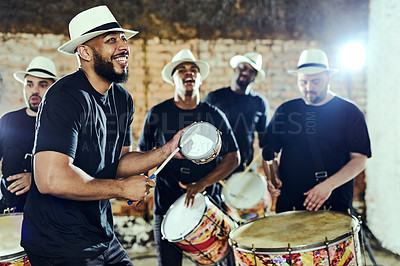 Buy stock photo Shot of a group of musical performers playing together indoors