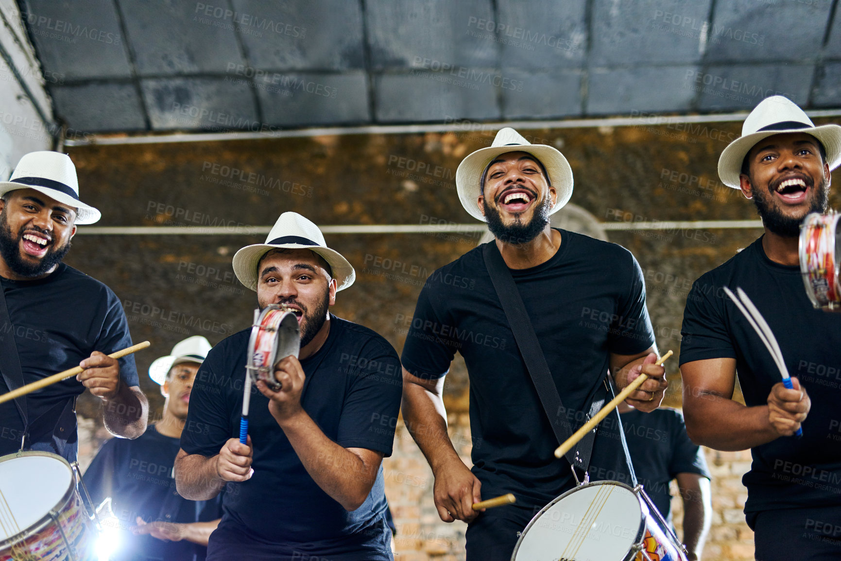 Buy stock photo Shot of a group of musical performers playing together indoors