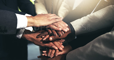 Buy stock photo Closeup shot of a group of unidentifiable businesspeople joining their hands in a huddle