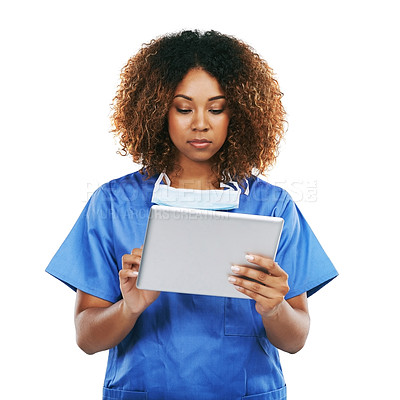 Buy stock photo Black woman, doctor and tablet in studio for typing, focus or communication on internet by white background. Isolated nurse, touchscreen tech or reading social media app, article or science news