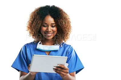 Buy stock photo Doctor, black woman and tablet for typing in studio with smile, focus and web communication by white background. Isolated nurse, touchscreen tech or reading on social media app, medical news or chat