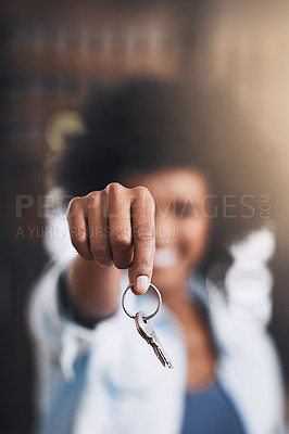 Buy stock photo Cropped shot of a young woman holding house keys in her new home