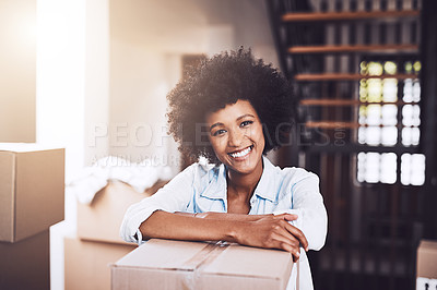 Buy stock photo Cropped shot of an attractive young woman in her new home