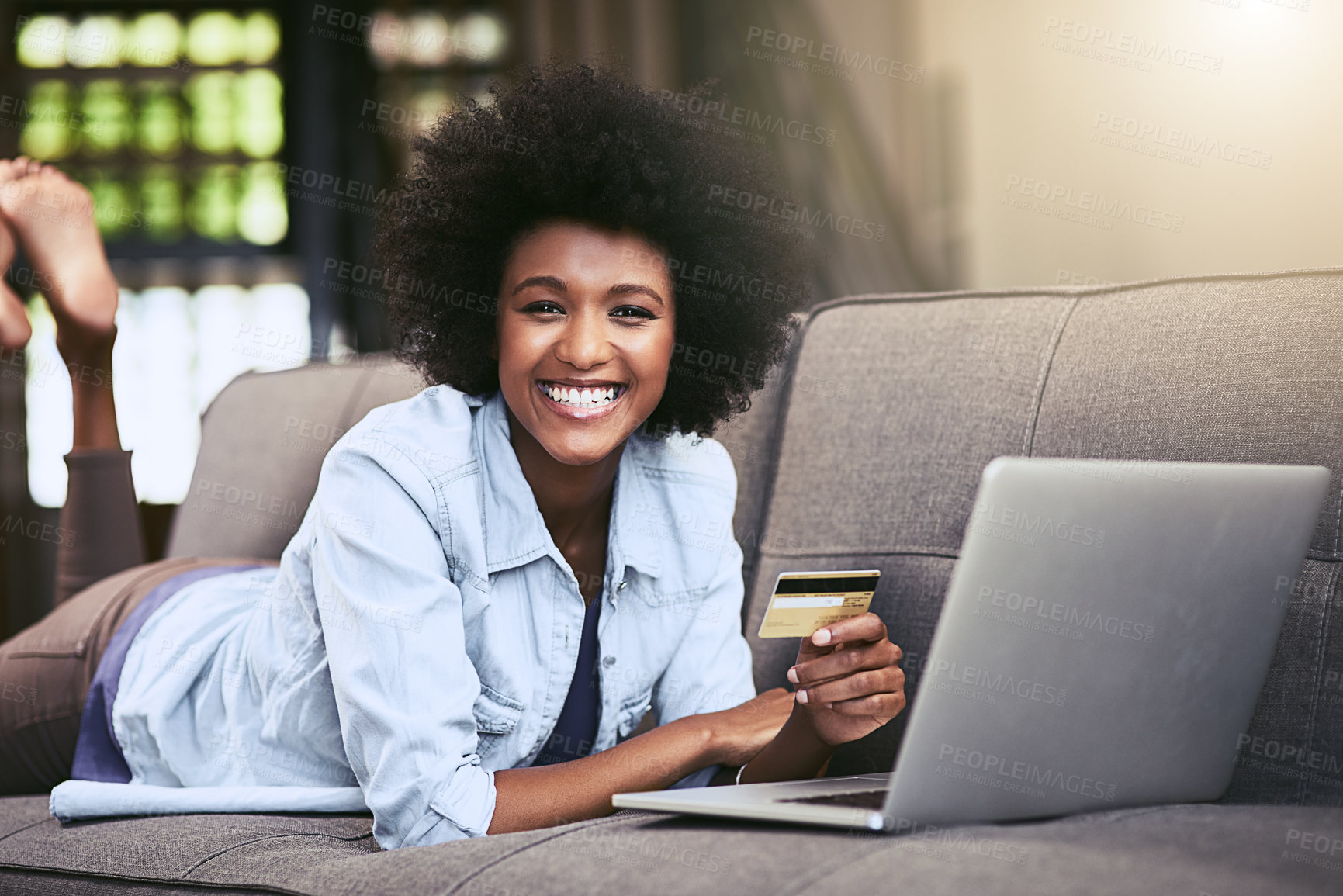 Buy stock photo Black woman, portrait and credit card on sofa in house for ecommerce, relax and online shopping. Female person, laptop and digital payment for internet subscription, membership or fast food discount