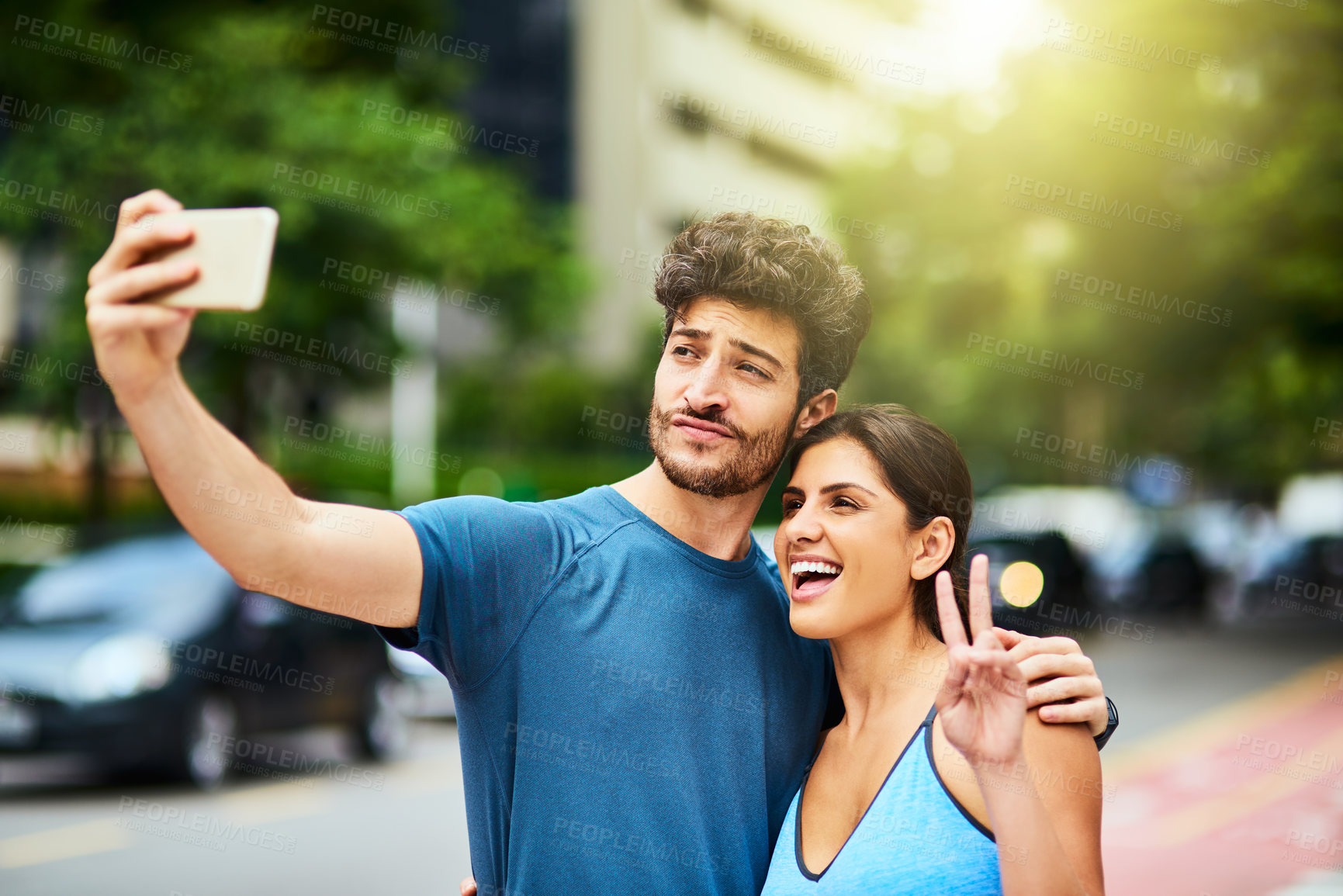 Buy stock photo Selfie, couple and peace sign for social media, profile picture and post update and smile and online. Park, outside and nature for exercise, married people and together for memories on technology